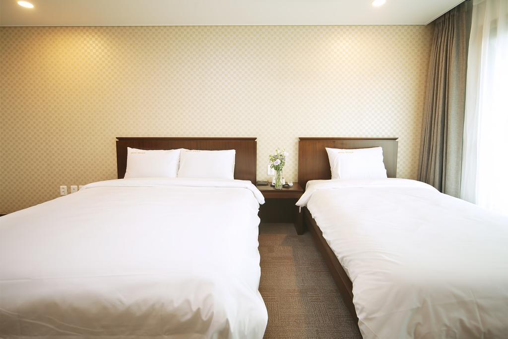 Sea View Hotel Jeju Quarto foto